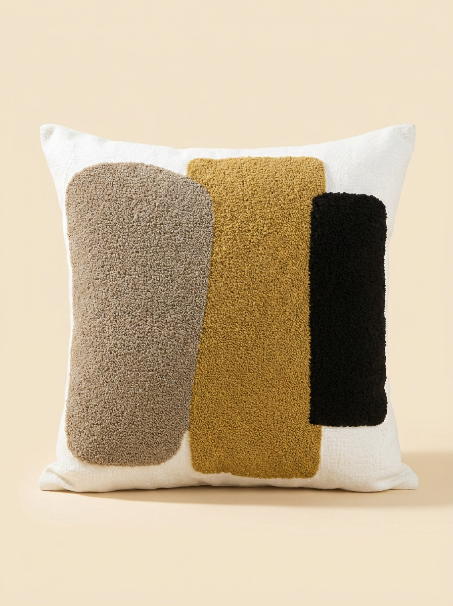 Housse de coussin touffetée Naïa à relief géométrique